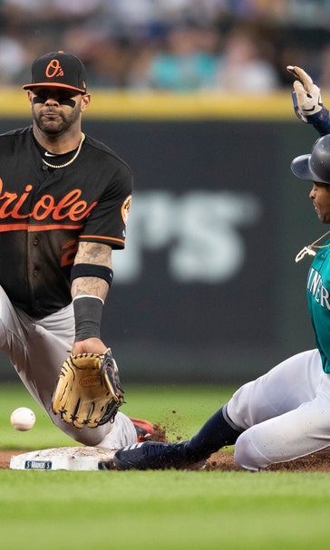 Mariners win 10-9, hand Orioles 10th straight loss